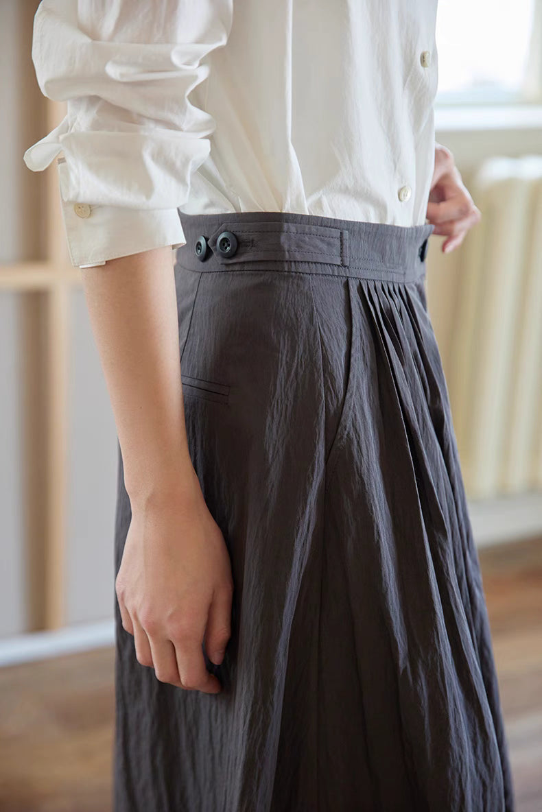 The Poised Pleated Midi Skirt