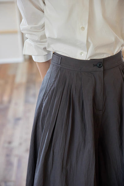 The Poised Pleated Midi Skirt