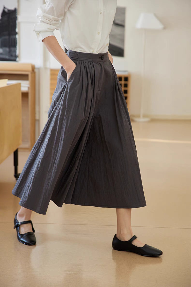 The Poised Pleated Midi Skirt