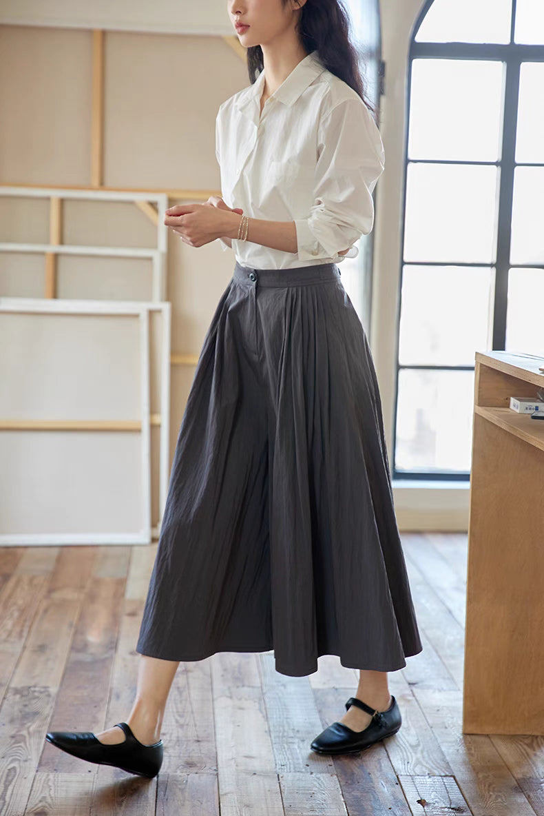 The Poised Pleated Midi Skirt