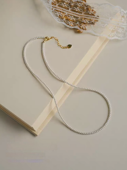 Radiant Round Pearl Necklace